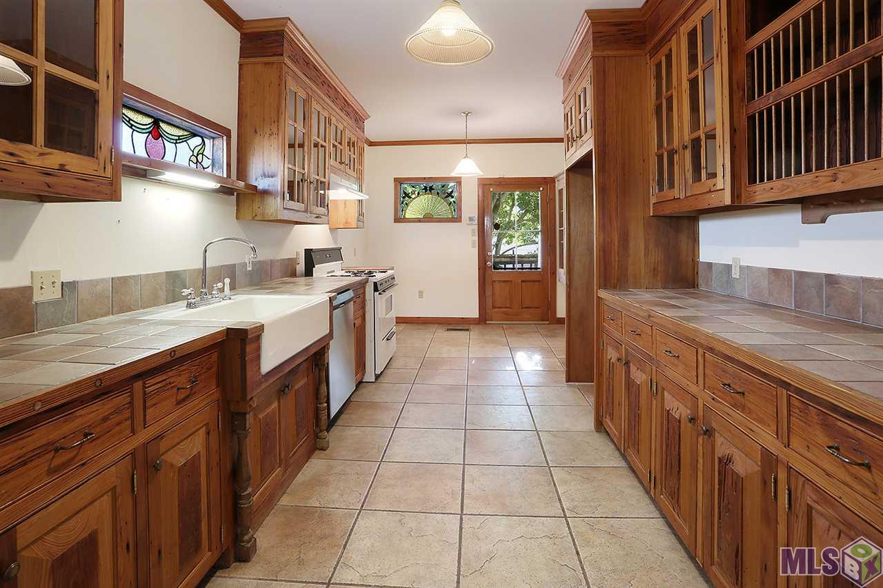 781 North Street Baton Rouge, LA 70802 - Photo 21 of 40 Kitchen and exit to large back porch
