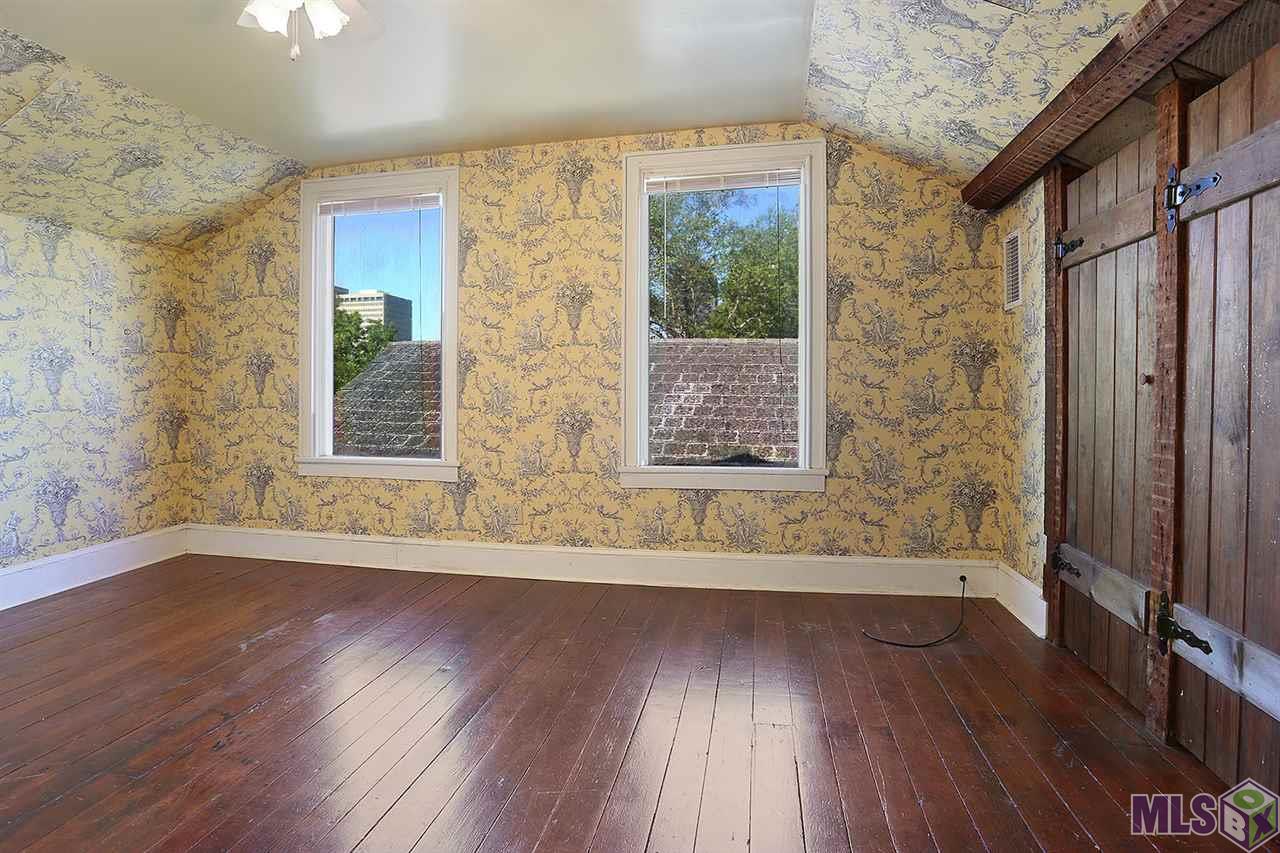 781 North Street Baton Rouge, LA 70802 - Photo 35 of 40 Upstairs bedroom with a full bath