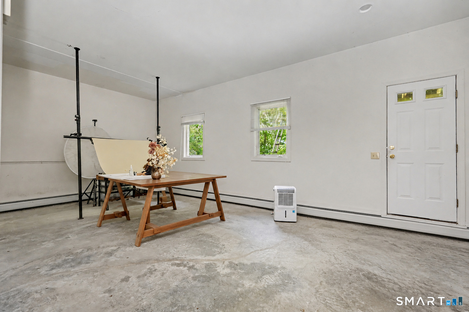 17 Goodhill Road Bethel, CT 06801 - Photo 22 of 26 Large basement room with nearly 12" ceiling.