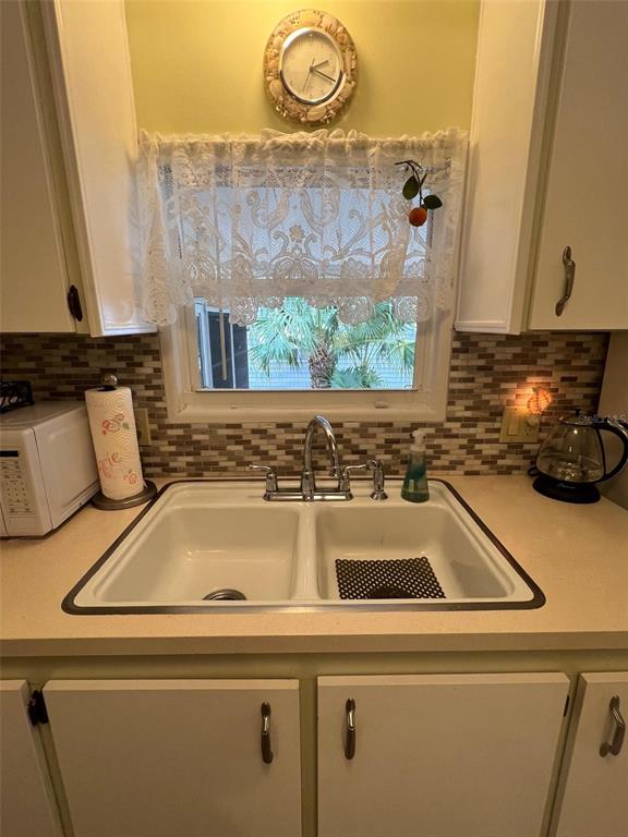 52 Frangipani Circle Largo, FL 33770 - Photo 11 of 33 a close view of sink and tap