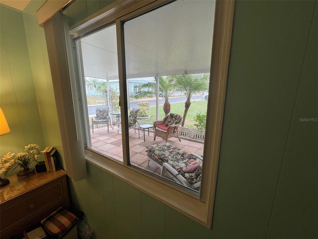 52 Frangipani Circle Largo, FL 33770 - Photo 30 of 33 a room with furniture and a window
