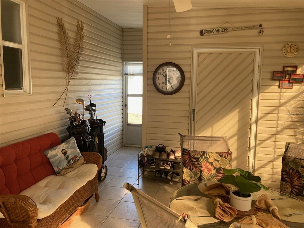 52 Frangipani Circle Largo, FL 33770 - Photo 3 of 33 a view of a entryway with furniture