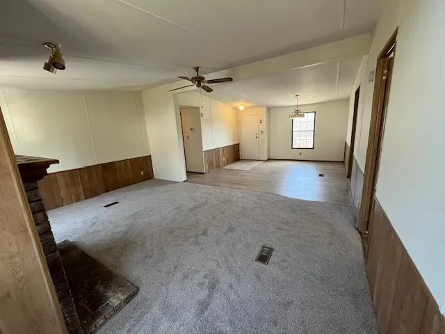 a wooden door in front of a house