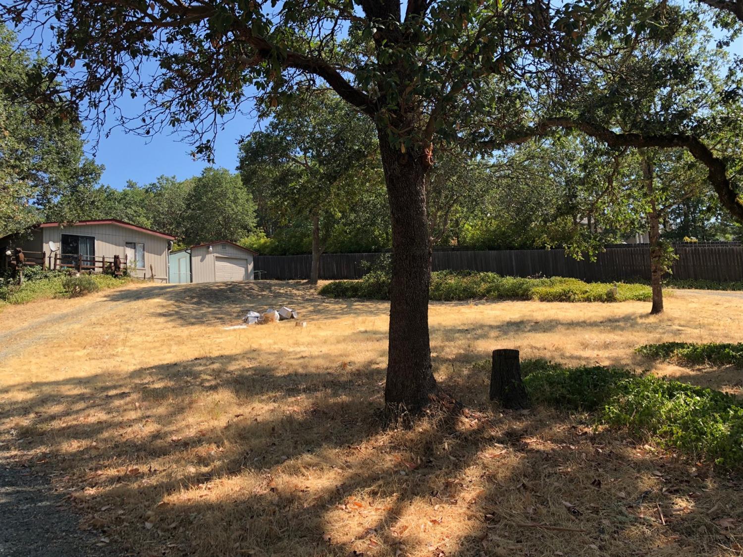 881 Three Pines Road Grants Pass, OR 97526 - Photo 4 of 15 a view of swimming pool with a yard