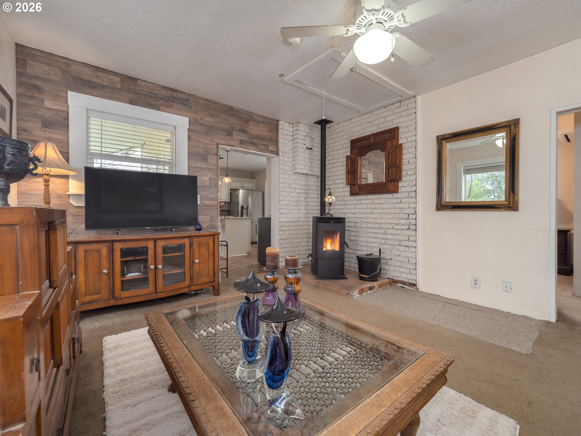 336 North 5th Street Carlton, OR 97111 - Photo 16 of 48 a living room with furniture and a flat screen tv