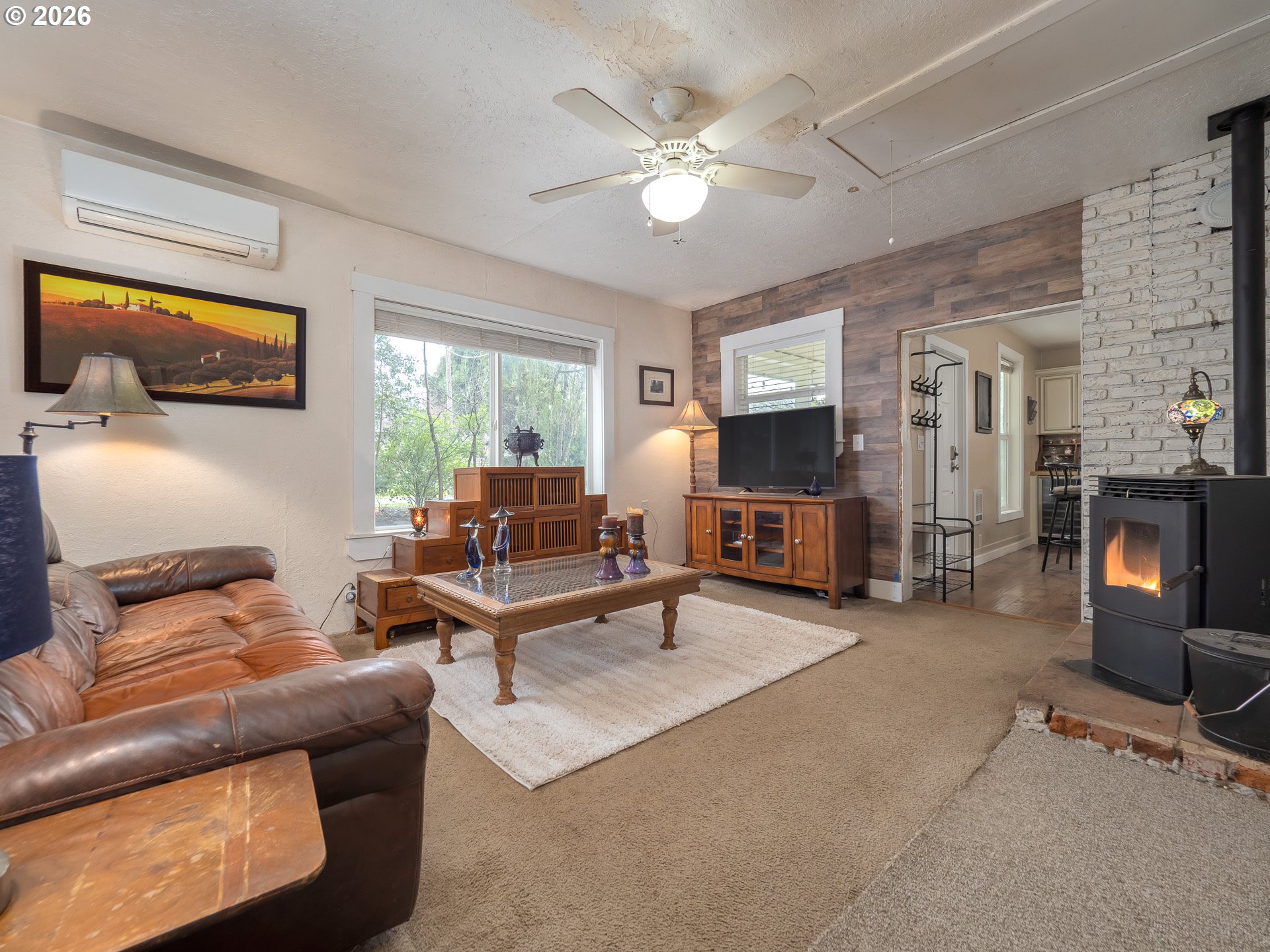 336 North 5th Street Carlton, OR 97111 - Photo 18 of 48 a living room with furniture and a flat screen tv