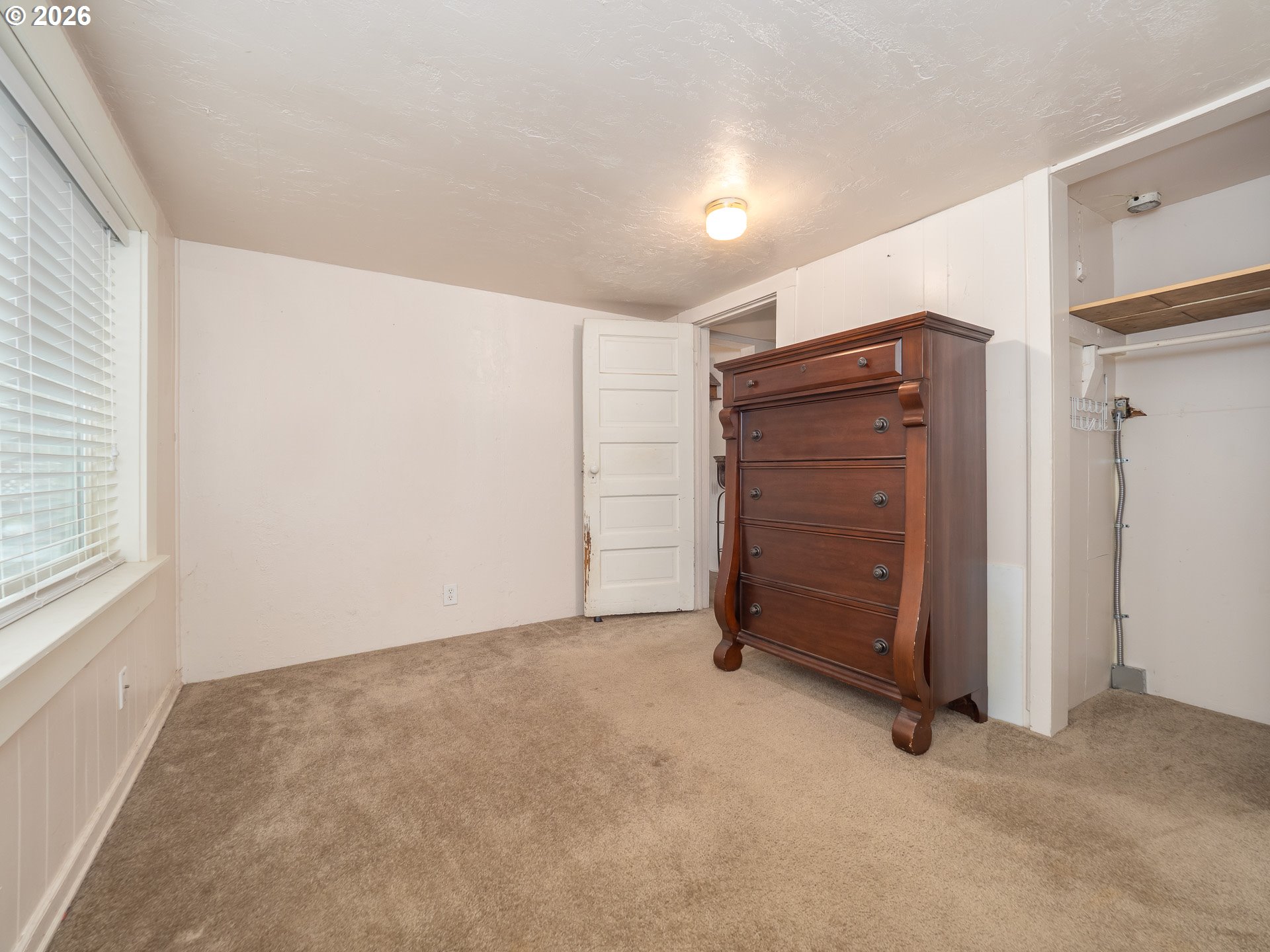 336 North 5th Street Carlton, OR 97111 - Photo 27 of 48 an empty room with furniture and a window