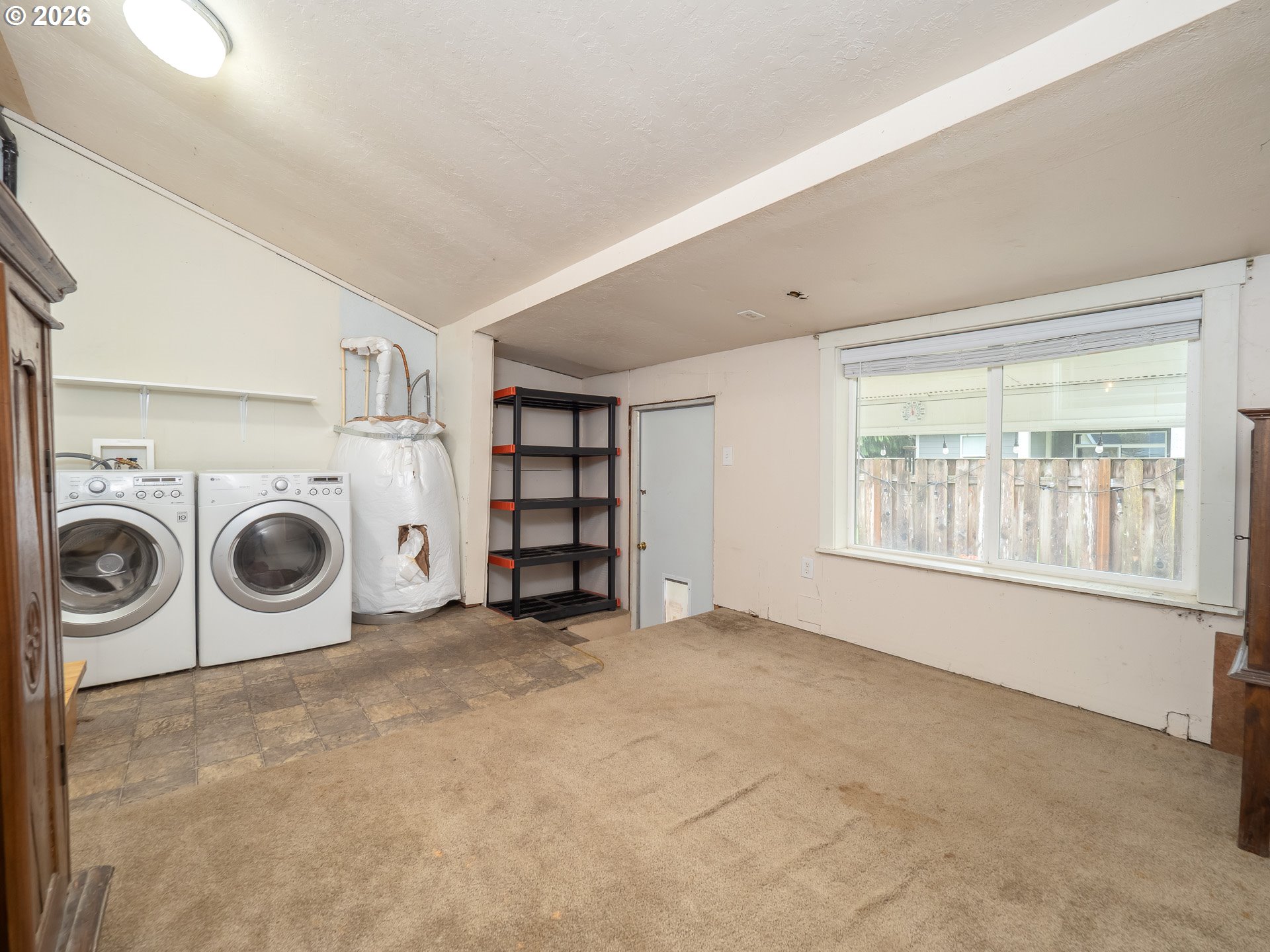 336 North 5th Street Carlton, OR 97111 - Photo 30 of 48 a view of a storage & utility room with washer and dryer