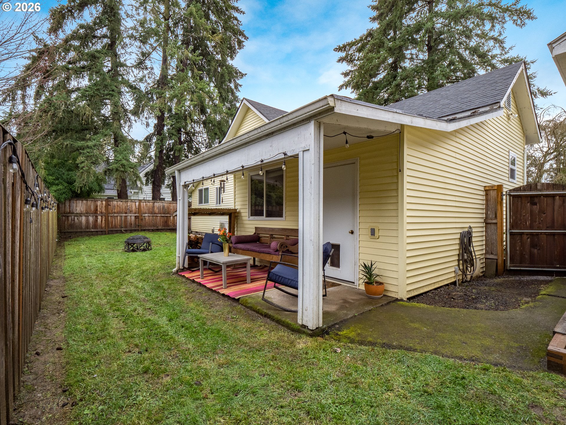 336 North 5th Street Carlton, OR 97111 - Photo 32 of 48 a view of a backyard with a patio