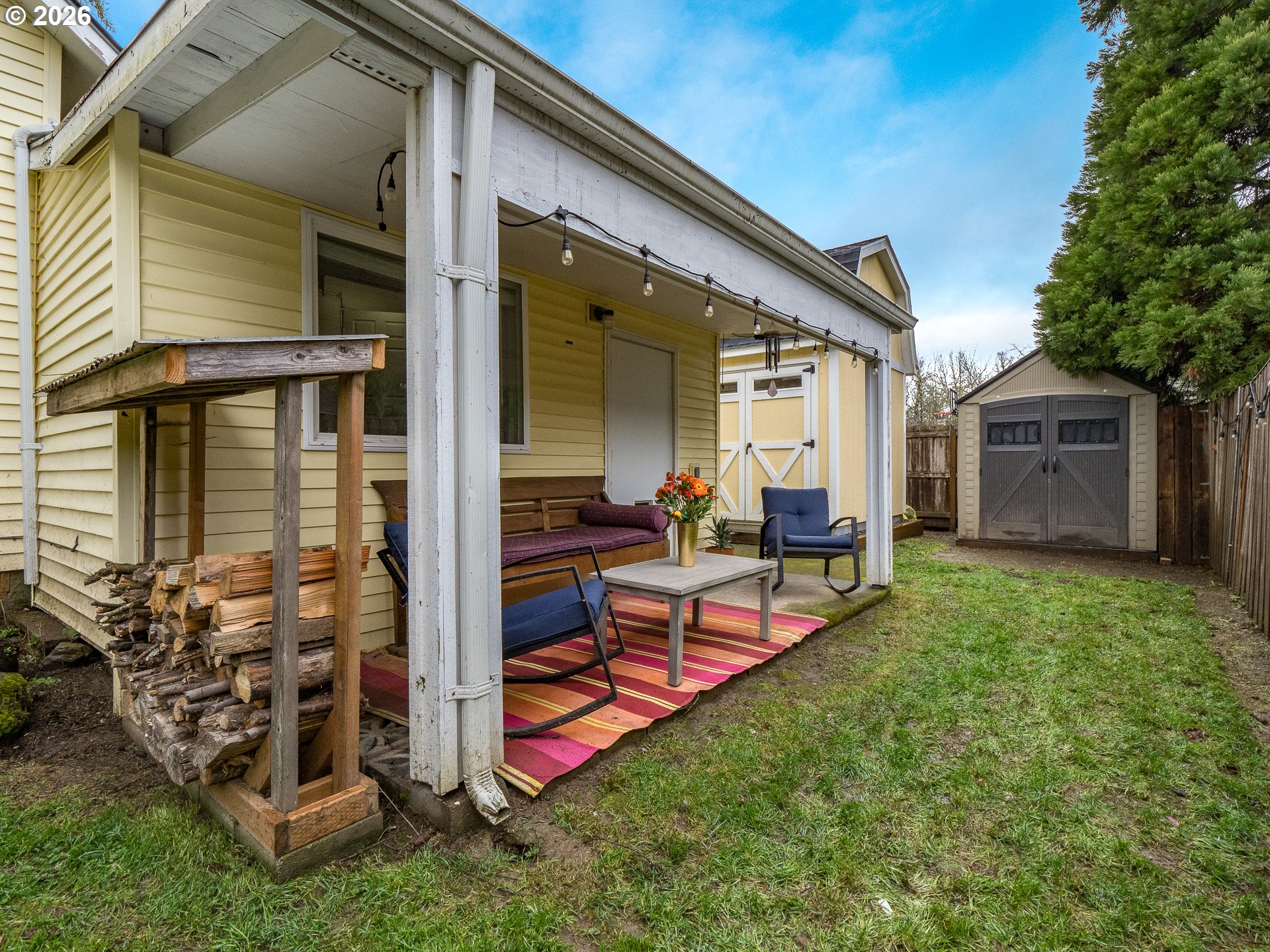 336 North 5th Street Carlton, OR 97111 - Photo 36 of 48 a view of a house with backyard and porch
