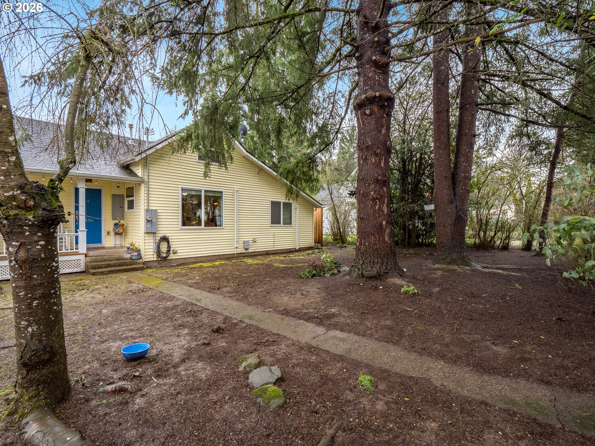 336 North 5th Street Carlton, OR 97111 - Photo 40 of 48 a white house that has a tree in front of it
