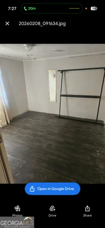 a living room with a couch and a table