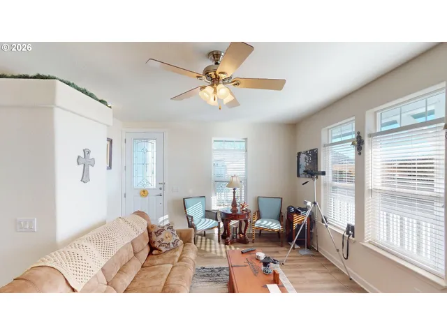 a living room with furniture and a window