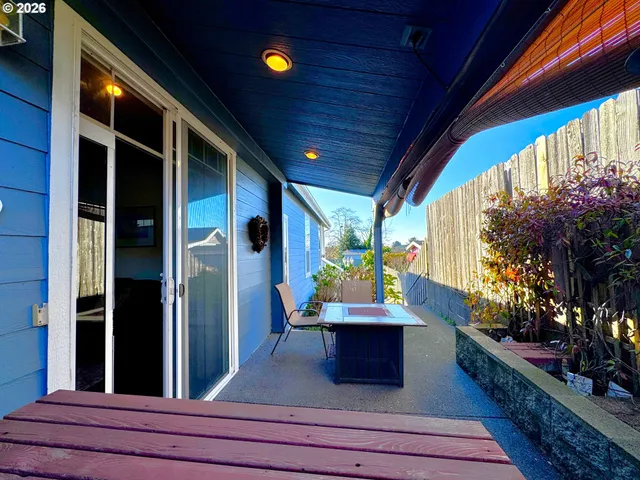 a view of sitting area in front of house