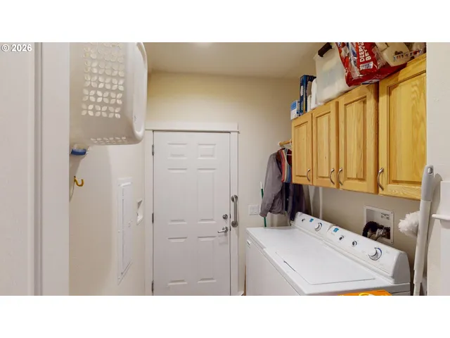 a bathroom with a sink a mirror and shower