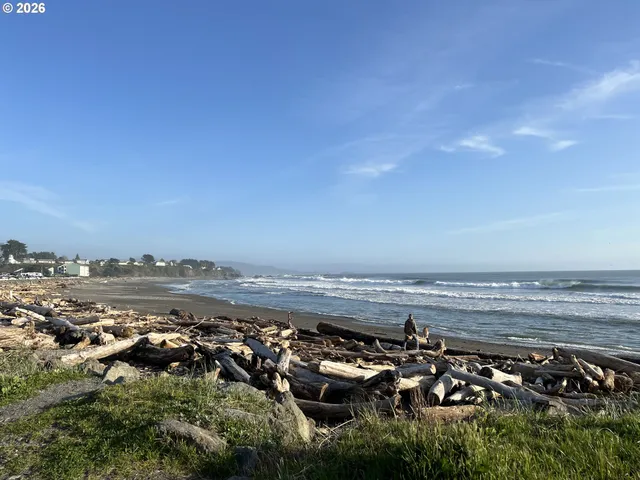 a kitchen with stainless steel appliances granite countertop a refrigerator sink and white cabinets