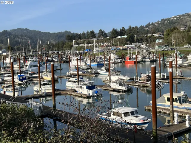a view of a balcony with chairs