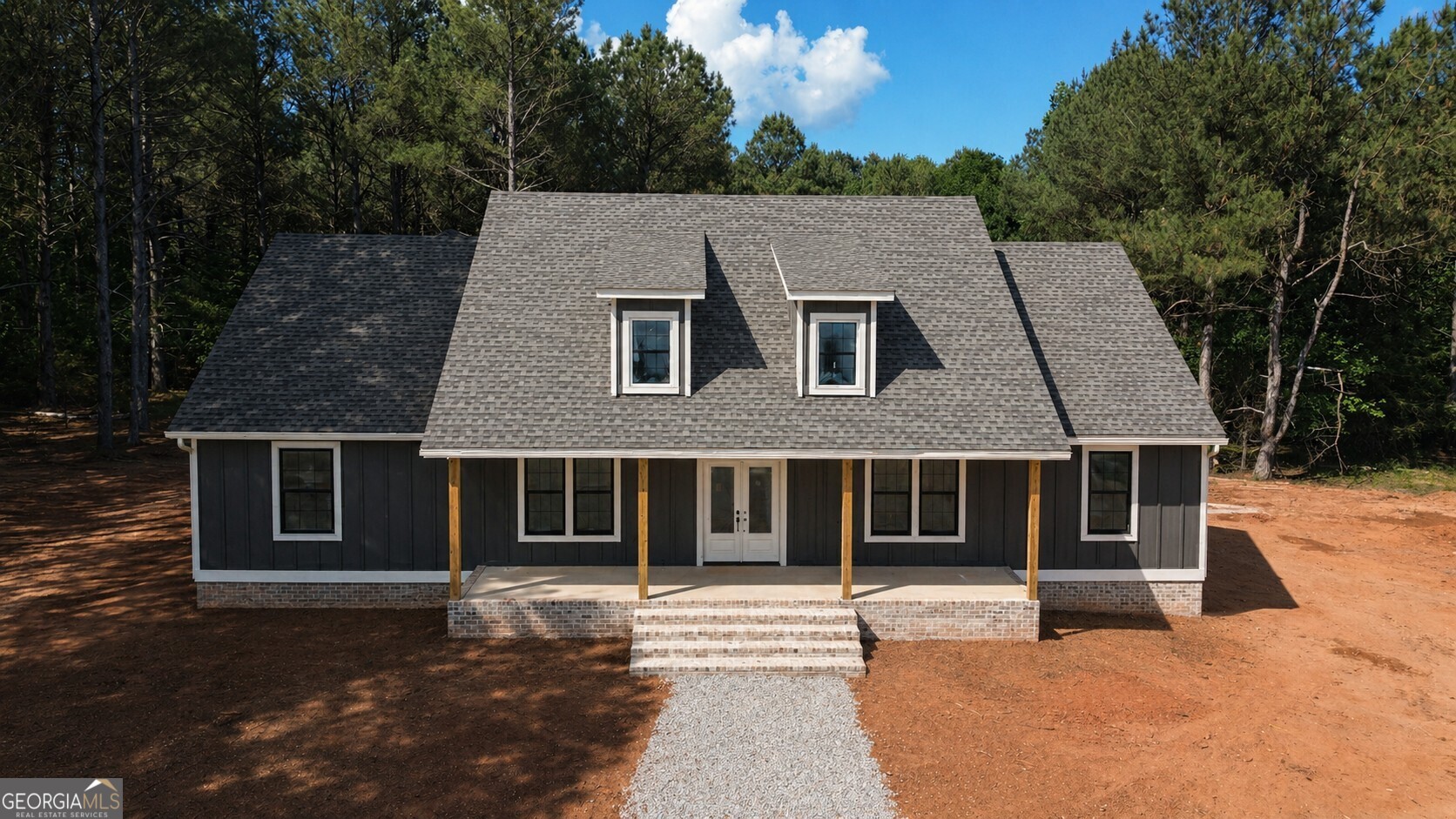 760 Frank Crook Road Canon, GA 30520 - Photo 4 of 7 a front view of a house with a yard