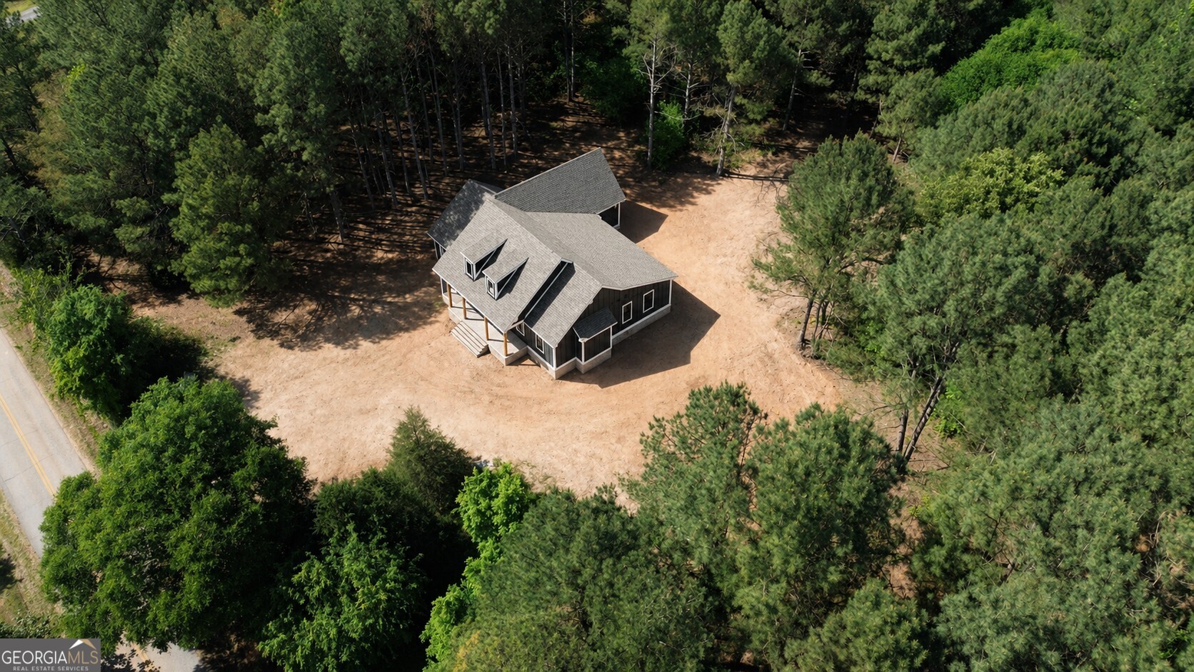 760 Frank Crook Road Canon, GA 30520 - Photo 7 of 7 an aerial view of a house with yard and lake view