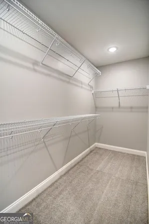 a view of a room with racks on the wall