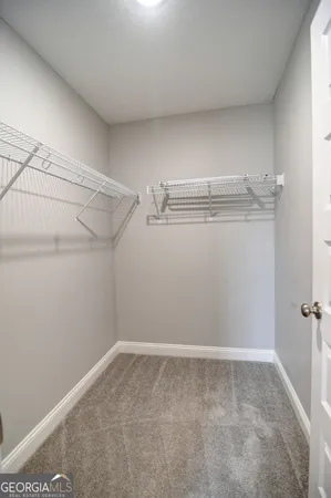 a view of a room with racks on the wall