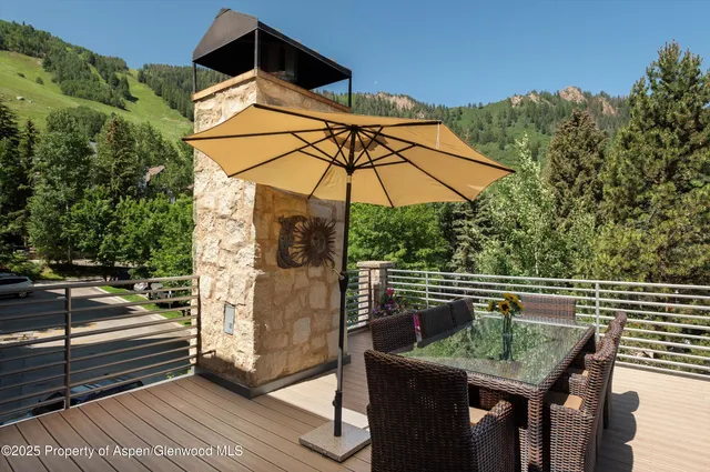 a view of a terrace with furniture
