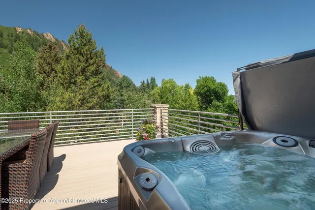 a view of a balcony and floor to ceiling window