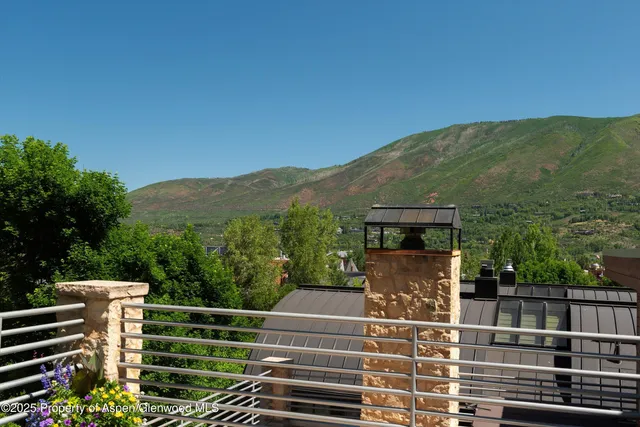 a view of a balcony with an outdoor space