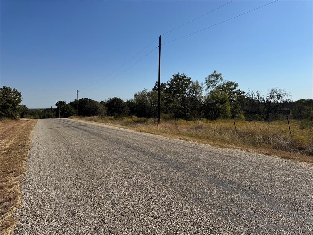 Tbd Tbd Wild Hill Springtown, TX 76082 - Photo 13 of 15 a view of a dry yard with wooden fence