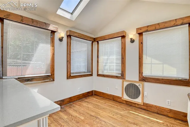 a view of livingroom with furniture and windows
