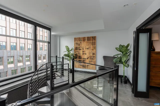 a view of a living room and dining room