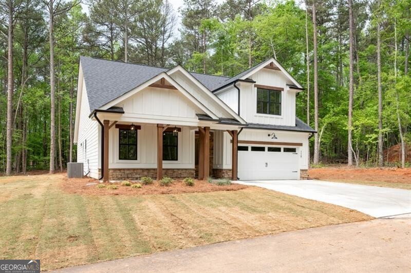 110 Doris Path Dallas, GA 30157 - Photo 33 of 35 a front view of a house with a yard