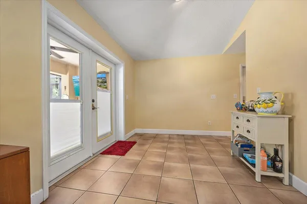 a room with a washing machine and a sink