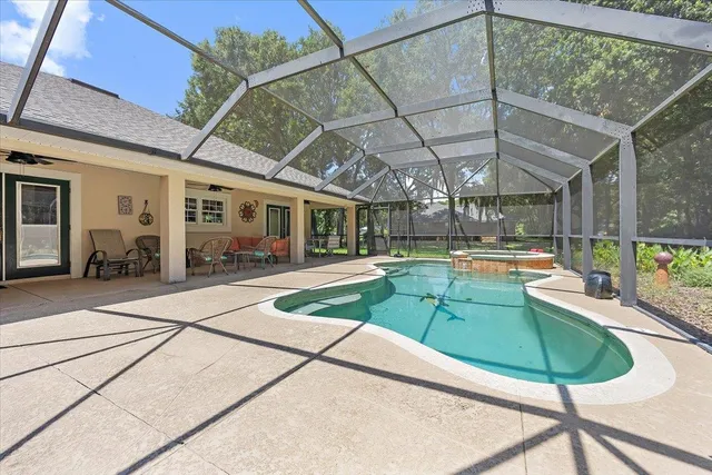 a backyard of a house with lots of green space