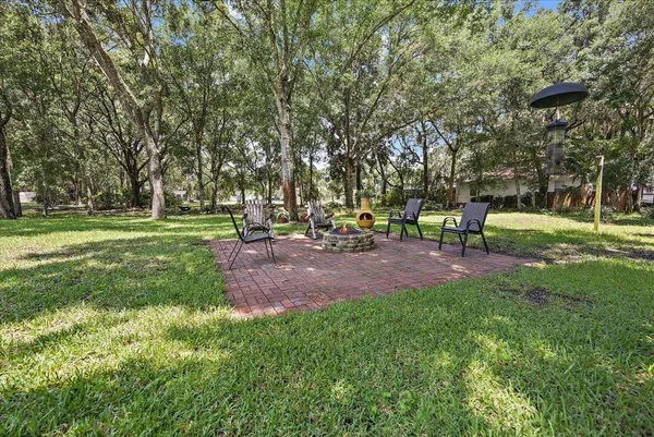a view of a house with a big yard
