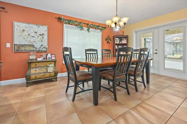 a dining room well furnished