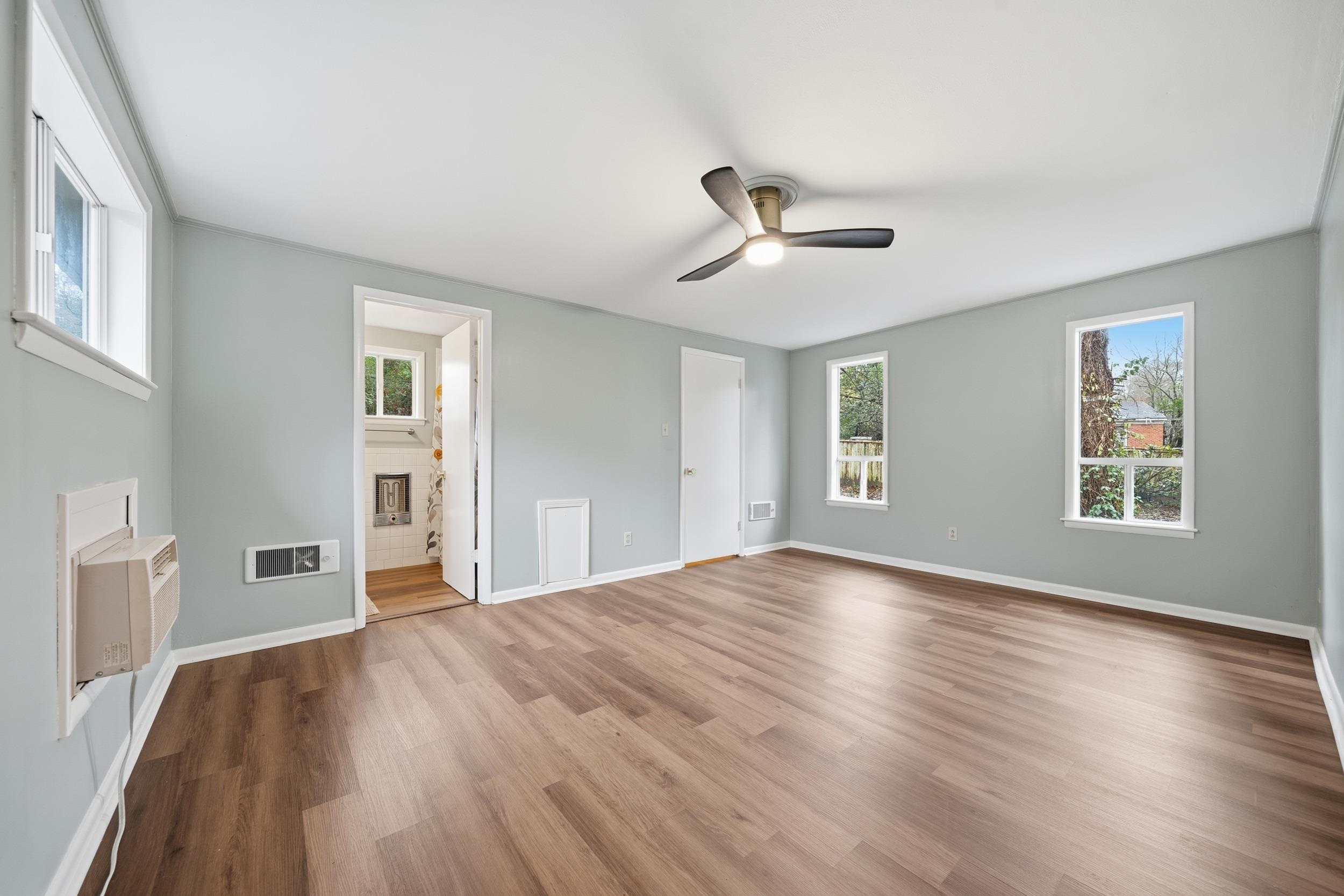 2534 Elmore Park Road Bartlett, TN 38134 - Photo 18 of 35 a view of empty room with wooden floor and fan