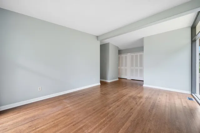 a view of an outside dining space with furniture