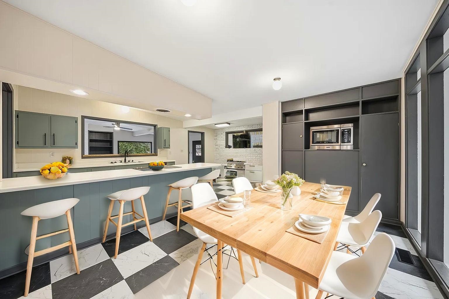 2534 Elmore Park Road Bartlett, TN 38134 - Photo 7 of 35 a dinning room with stainless steel appliances kitchen island granite countertop a dining table and chairs