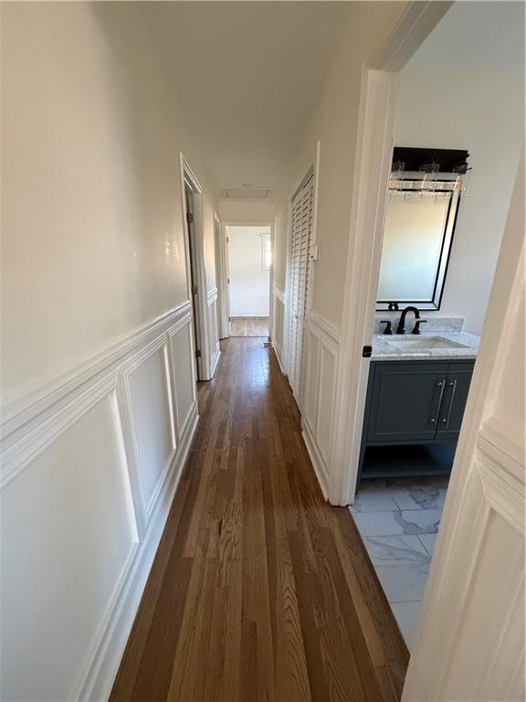 2484 Ortega Way Atlanta, GA 30341 - Photo 12 of 28 a view of a hallway view with wooden floor and staircase