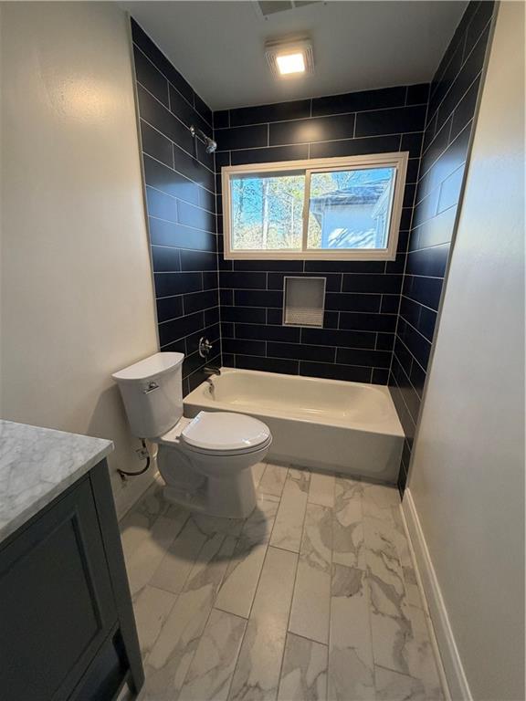 2484 Ortega Way Atlanta, GA 30341 - Photo 14 of 28 a bathroom with a sink toilet and shower