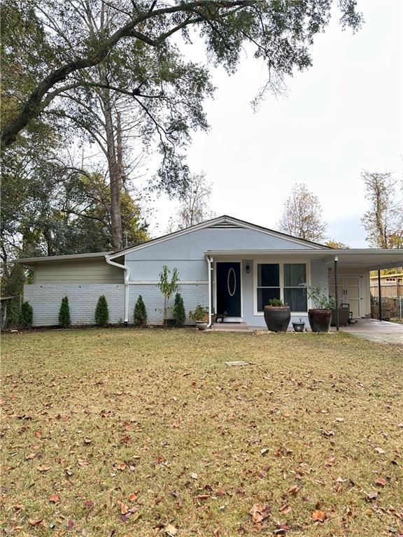 2484 Ortega Way Atlanta, GA 30341 - Photo 2 of 28 front view of a house with a patio