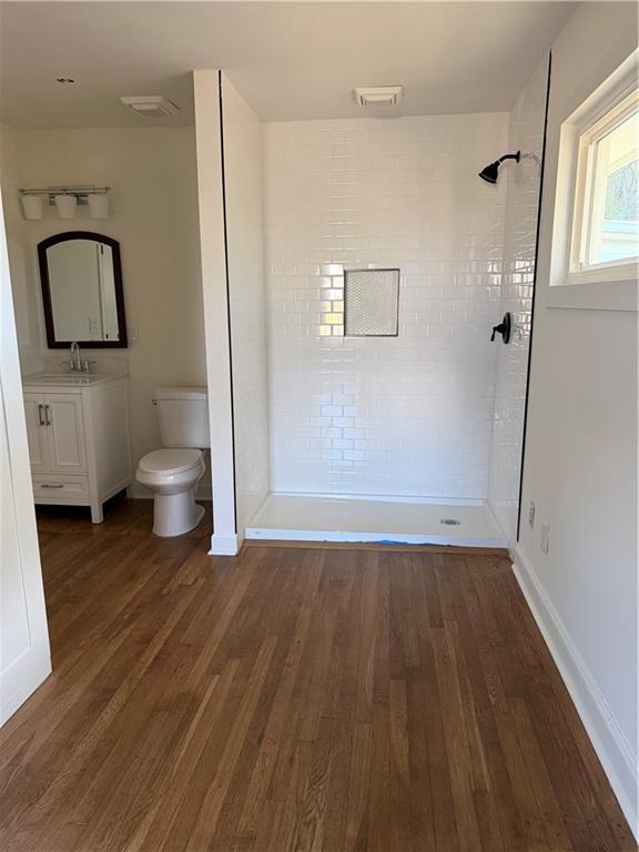 2484 Ortega Way Atlanta, GA 30341 - Photo 22 of 28 a bathroom with a toilet and a mirror