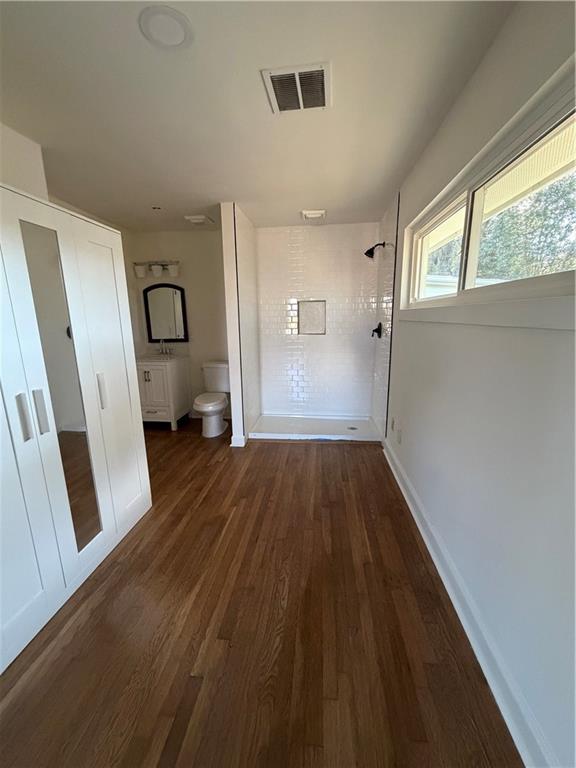 2484 Ortega Way Atlanta, GA 30341 - Photo 23 of 28 a view of empty room with wooden floor and fan