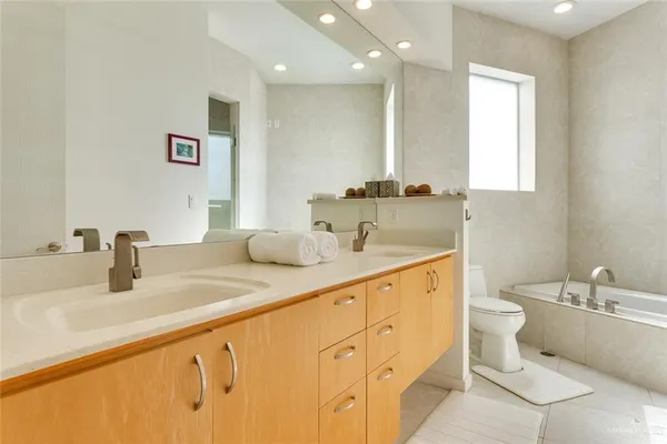 a bathroom with a sink and a toilet