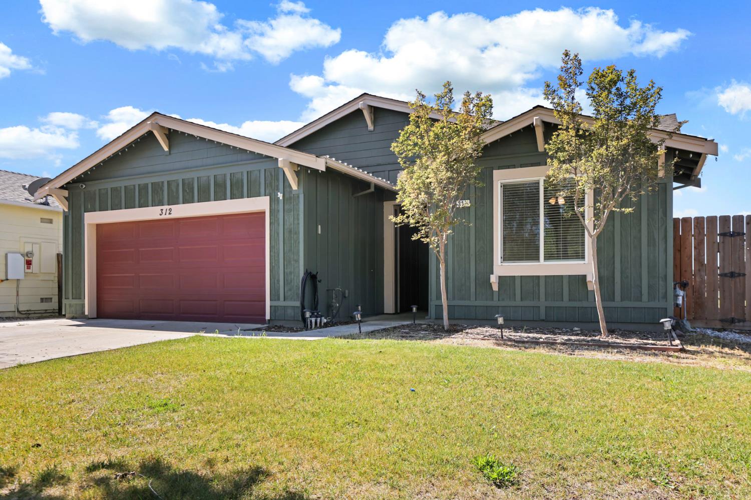 312 Copper Crest Drive Copperopolis, CA 95228 - Photo 1 of 38 a front view of a house with a yard