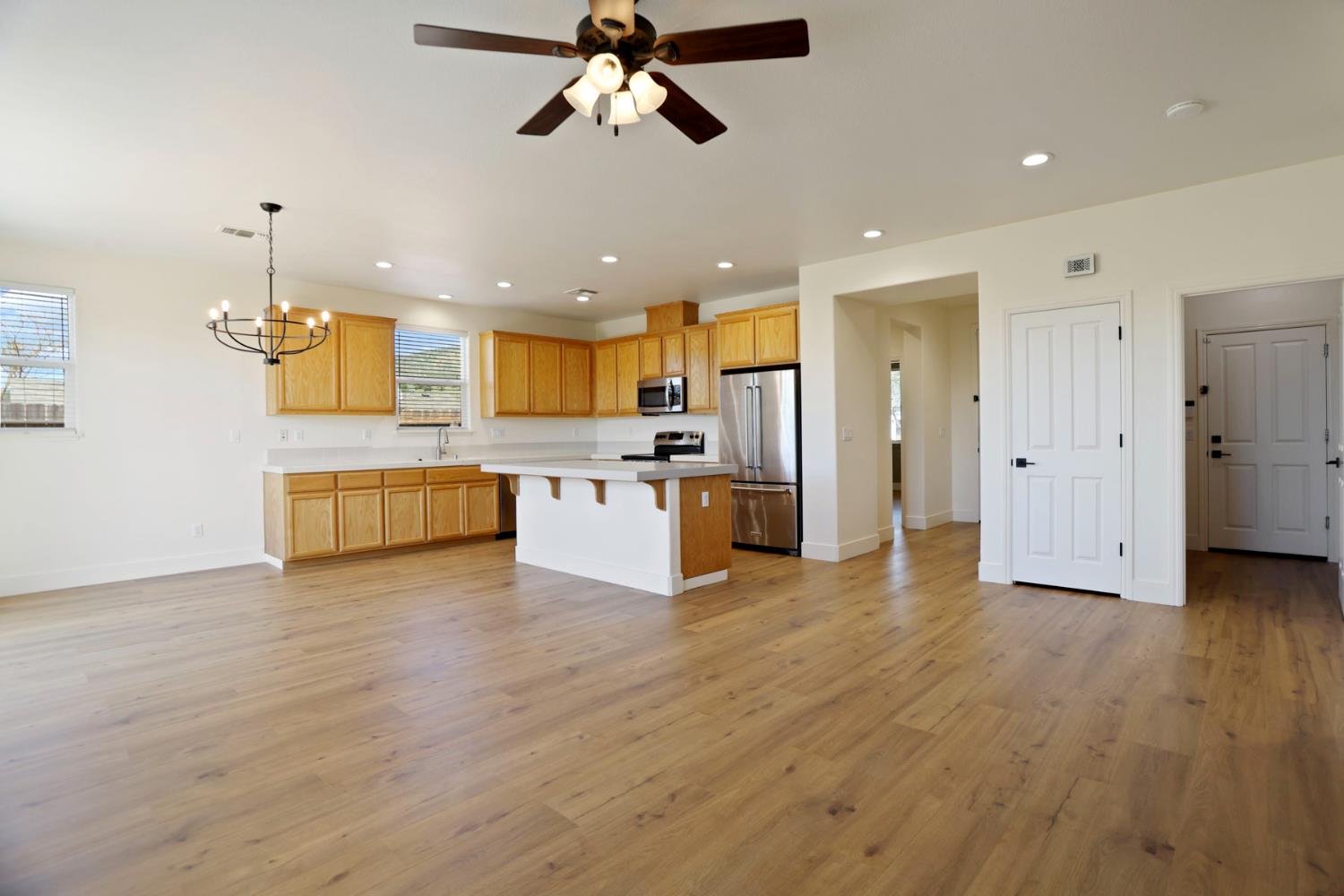 312 Copper Crest Drive Copperopolis, CA 95228 - Photo 19 of 38 a view of a kitchen with a sink cabinets and stainless steel appliances