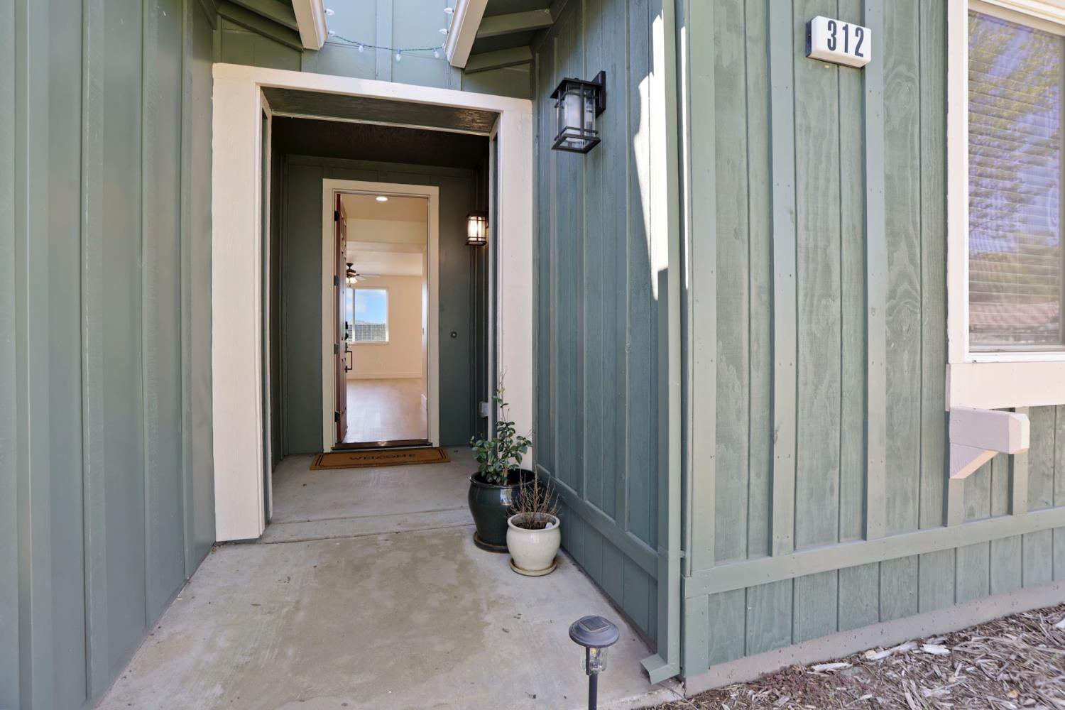312 Copper Crest Drive Copperopolis, CA 95228 - Photo 23 of 38 a view of a livingroom and front door
