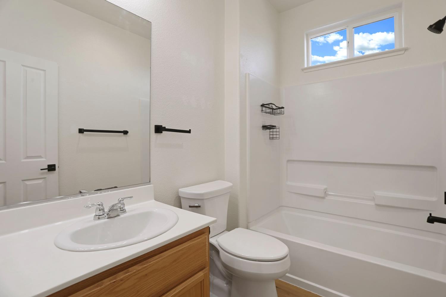 312 Copper Crest Drive Copperopolis, CA 95228 - Photo 26 of 38 a bathroom with a sink a toilet and shower