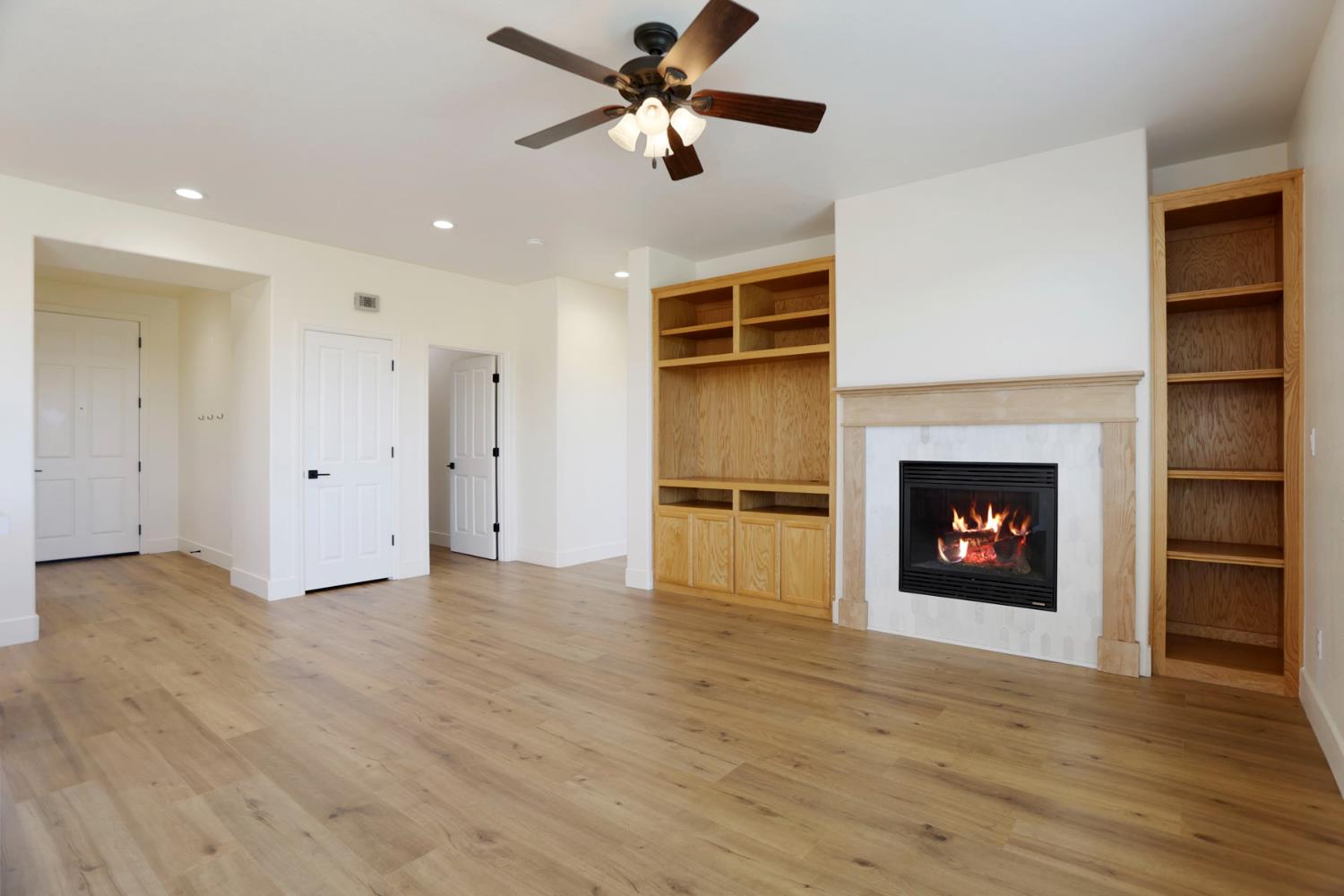 312 Copper Crest Drive Copperopolis, CA 95228 - Photo 34 of 38 a view of an empty room with a fireplace and a window